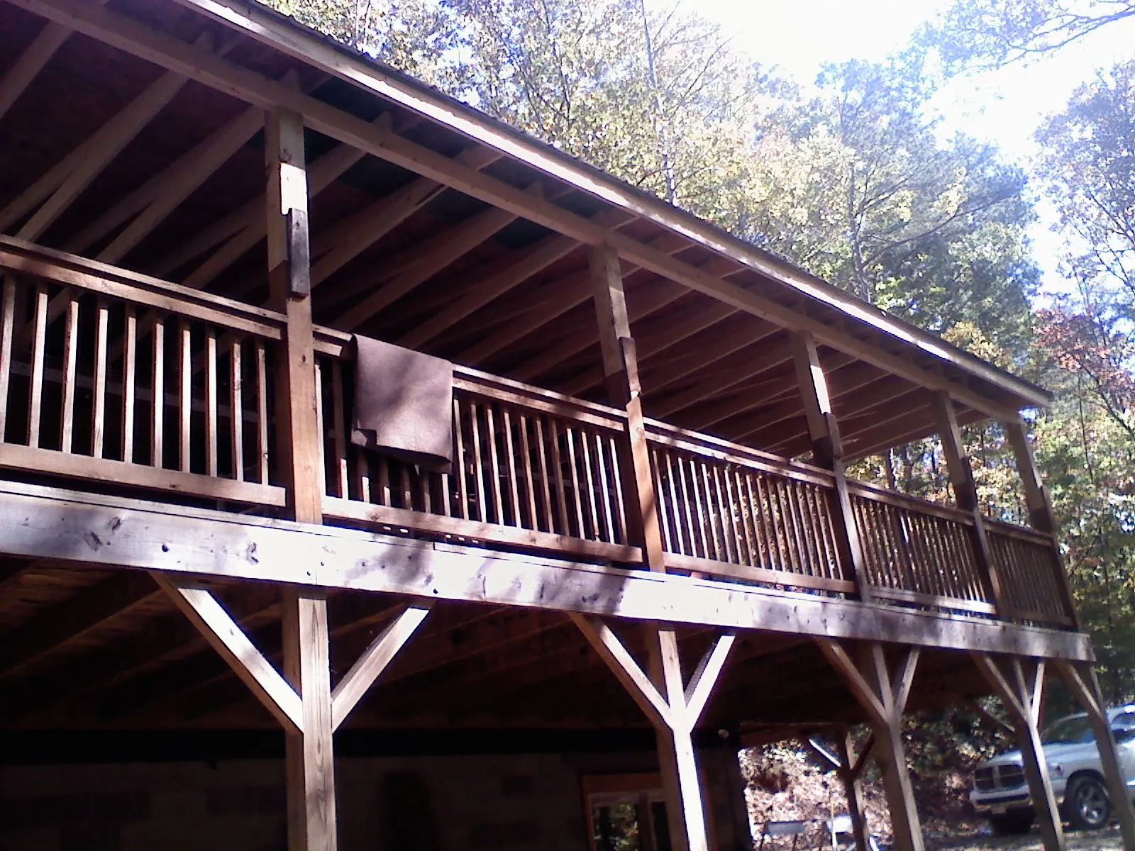 Timber framing under a new elevated porch and deck — Roof Leak Repair in Pickrell by Roofing Brothers